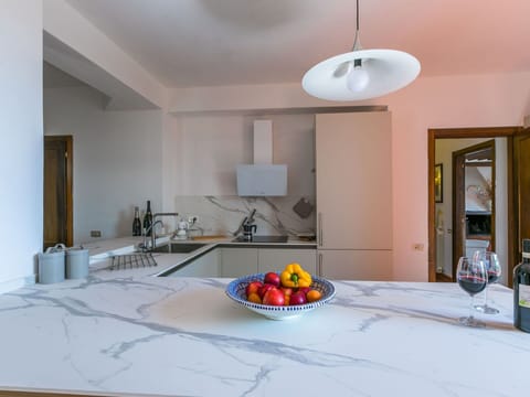 Interior Design, Flooring, Countertop, Furniture, Kitchen, Ceiling, Floor, Light Fixture, Natural Material, Wood Stain