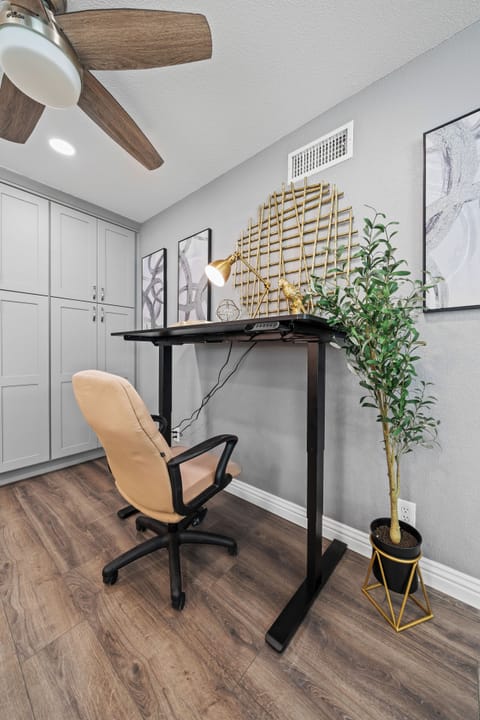 Equipped with a desk, lamp, and calming décor to boost productivity.