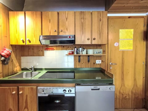 Kitchen, Kitchen Appliance, Countertop, Major Appliance, Wood, Flooring, Furniture, Cabinetry, Interior Design, Kitchen Sink