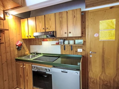 Wood, Flooring, Floor, Interior Design, Cabinetry, Kitchen, Room, Furniture, Countertop, Major Appliance