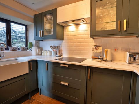 Kitchen, Countertop, Cabinetry, Kitchen Appliance, Interior Design, Major Appliance, Furniture, Wood, Flooring, Drawer