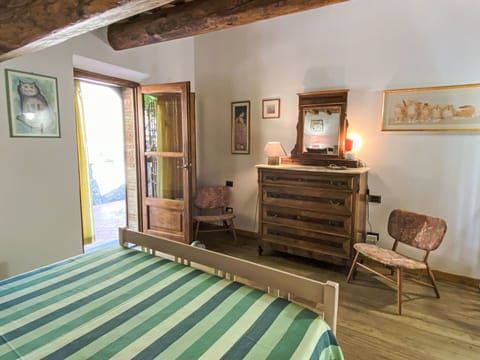 Furniture, Interior Design, Flooring, Wood, Bedroom, Floor, Bed, Room, Bed Sheet, Picture Frame