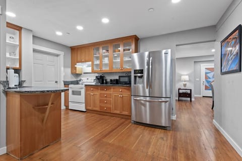 Beautiful kitchen with updated appliances and custom countertops