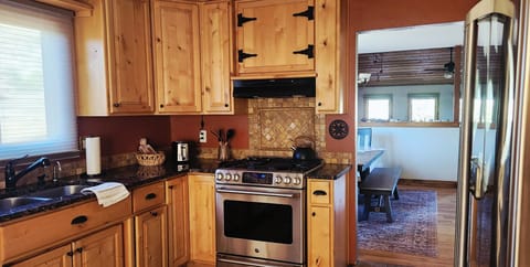 Fully equipped kitchen with gas stove