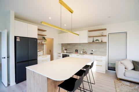 full-size kitchen with the essentials to cook your favorite meals like at home 