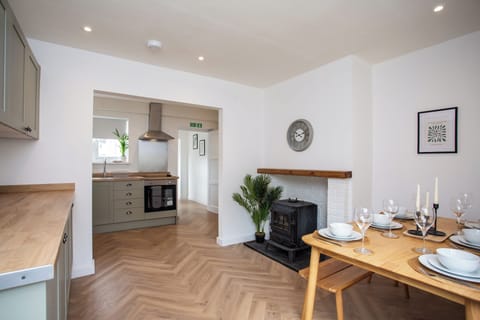 Contemporary kitchen with dining area—perfect for enjoying meals together in comfort.