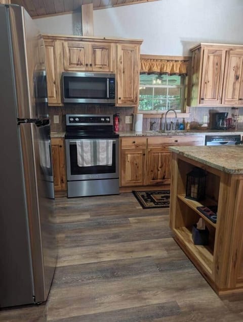 Full Kitchen with full size refrigerator, stove with oven , microwave and dishwasher. Coffee pot and toaster are also available. Papertowels, dish clothes, and dish towels, dish soap and dishwasher soap.
