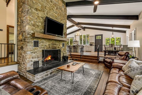 Living Area w/ Wood Burning Fireplace and Smart TV