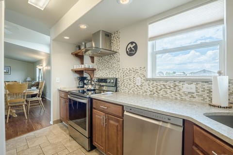 Modern appliances and charming touches included.