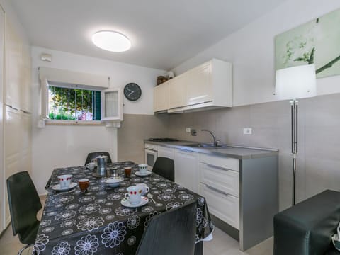 Interior Design, Furniture, Kitchen, Countertop, Flooring, Major Appliance, Kitchen Appliance, Floor, Room, Ceiling