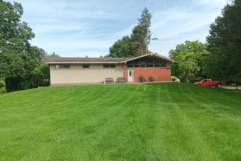 The Sanctuary House with parking on the side, then up a small incline.