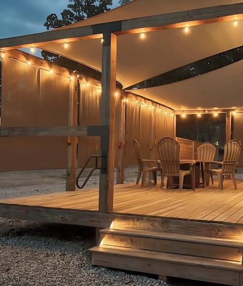 Enjoy family and friends under the soft glow of lights on the covered deck