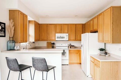 Kitchen with bar stools