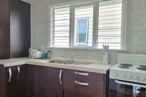 There is a breakfast bar with jug, toaster, coffee plunger and teapot. We provide complimentary tea, coffee, drinking chocolate and plunger coffee.