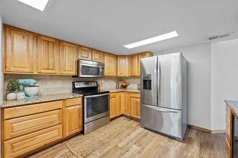 Whip up meals with ease using the Ninja blender, signature KitchenAid mixer, Keurig, and classic coffee maker—perfect for coffee lovers and home chefs.