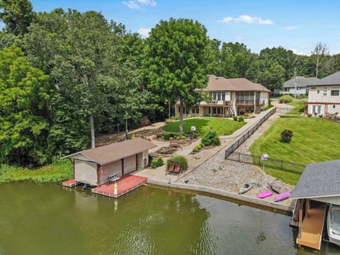 private boat dock with kayaks for guest use.