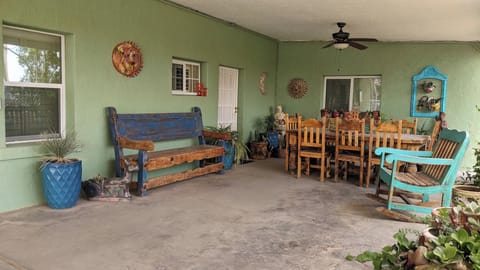 Colorful outdoor seating and dining area for 8 or more people! 