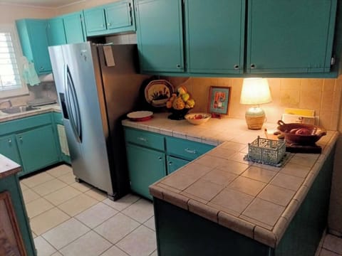 Updated kitchen with counter space for serving delicious meals.