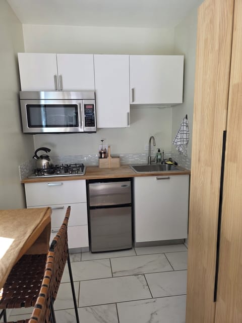 Kitchenette with bar seating.