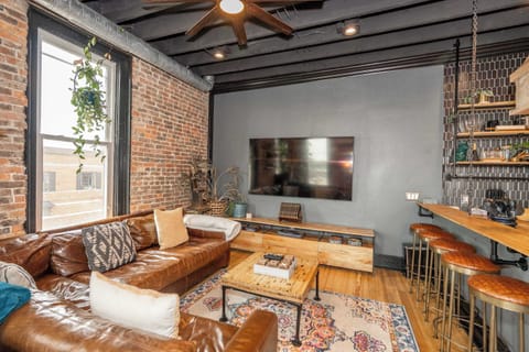 Unwind in the stylish living room & stream your favorites on the smart TV​