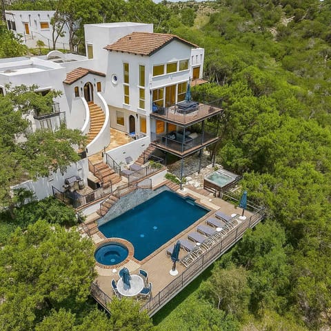 Luxury hillside escape with pool and spa.