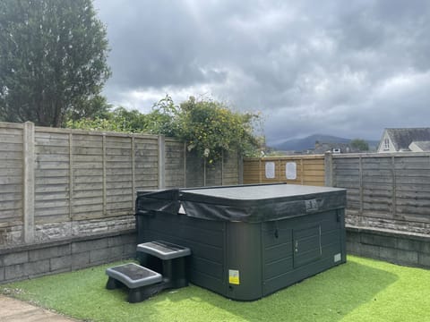 Relax in the hot tub after a day of exploring the Lake District!