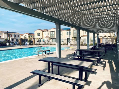 Community Amenities: two gated pools, open daily from 7 AM to 10 PM (Sun–Sat).