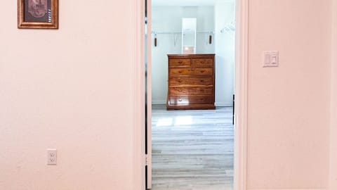 Master's closet - queen air mattress, spare linens/towels, & ironing facilities