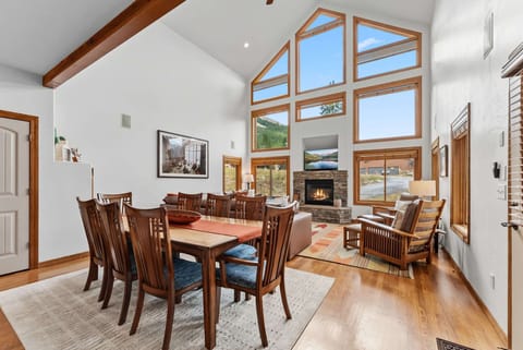 Dining area: 8-person dining table, open to kitchen and living area