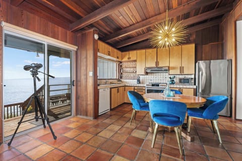 Fully equipped kitchen with ocean views and funky blue flair!