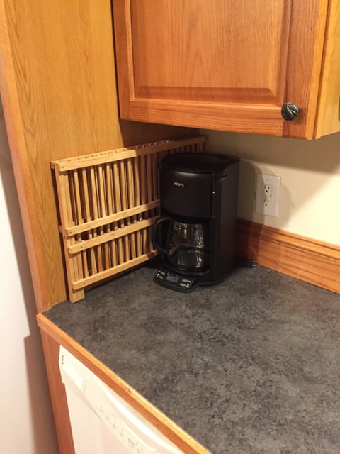 Kitchen counter beside sink.