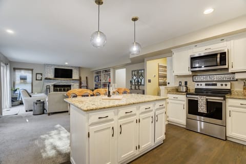 Beautifully updated kitchen with modern finishes and a seamless view into the living room so you can cook while staying connected.