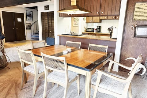 Dining table with view into kitchen