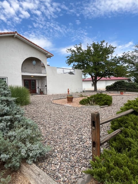 Front yard. Driveway runs right next to house on Right Side