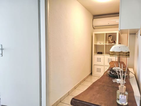 Wall, Flooring, Floor, Interior Design, Wood, Lighting, Ceiling, Room, Furniture, Door