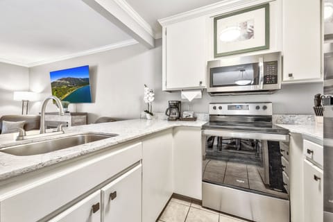 Kitchen. Exact unit will be assigned upon arrival. Views, colors, and decor may vary.