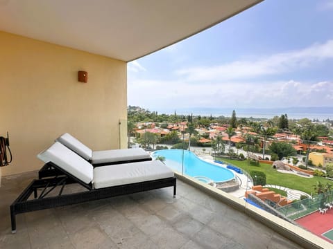 Private Balcony | Sun lounger with breathtaking Lake Chapala views for relaxing moments