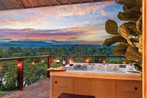 🌄 Soak in the bubbly bliss with wine, snacks, and mountain sunsets you'll never forget.