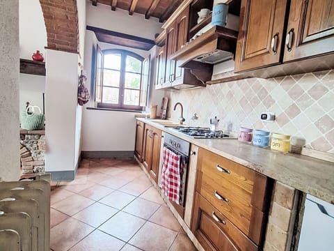 Kitchen, Countertop, Flooring, Interior Design, Wood, Furniture, Cabinetry, Floor, Major Appliance, Kitchen Appliance