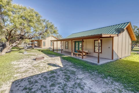 Covered porch, sits next to cabin 4