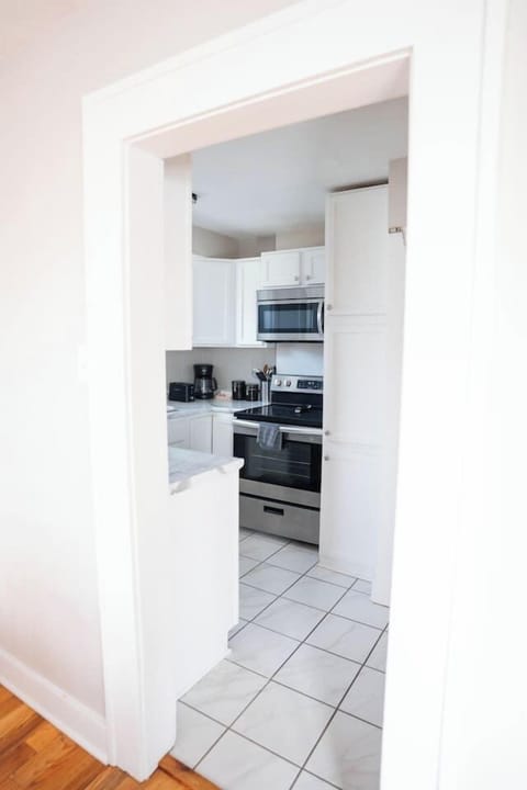 The kitchen is stocked with all the essentials—fridge, stove, oven, microwave, dishwasher, coffee maker, and blender. Whether you're making a full meal or just a quick cup of coffee, you’ll have everything you need.