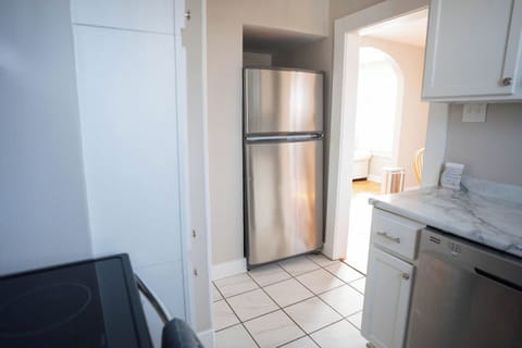The kitchen is stocked with all the essentials—fridge, stove, oven, microwave, dishwasher, coffee maker, and blender. Whether you're making a full meal or just a quick cup of coffee, you’ll have everything you need.