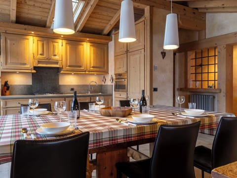 Furniture, Interior Design, Kitchen, Wood, Flooring, Ceiling, Light Fixture, Countertop, Chair, Room