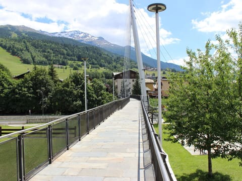 Cloud, Sky, Plant, Green, Street Light, Tree, Mountain, Slope, Biome, Line