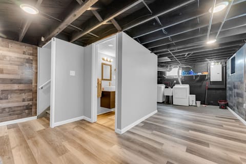 From the floor to the ceiling, this basement is a masterpiece of design. Love the warm tones and the cozy seating area. 😍From the floor to the ceiling, this basement is a masterpiece of design. Love the warm tones and the cozy seating area. 😍