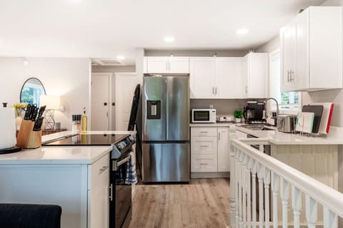 Unleash your inner chef in our well-equipped kitchen, complete with top-notch appliances and a comprehensive range of cooking essentials