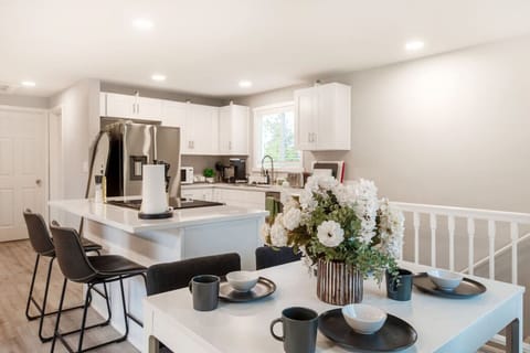 Dine in elegance in our well-appointed dining area. The stylish table and chairs set the scene for intimate meals or lively gatherings with friends and family. #SharedMeals #DiningPleasure