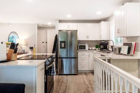 Unleash your inner chef in our well-equipped kitchen, complete with top-notch appliances and a comprehensive range of cooking essentials