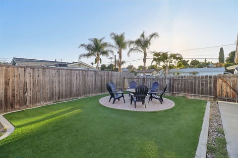 Relaxing in the backyard, where every corner offers a peaceful escape.