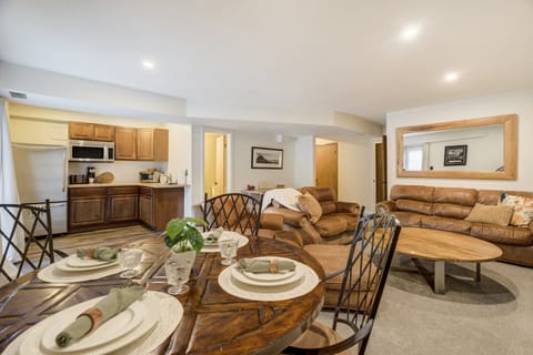 Beautiful open flow concept between the kitchenette, dining area, and living room in this walkout basement apartment.